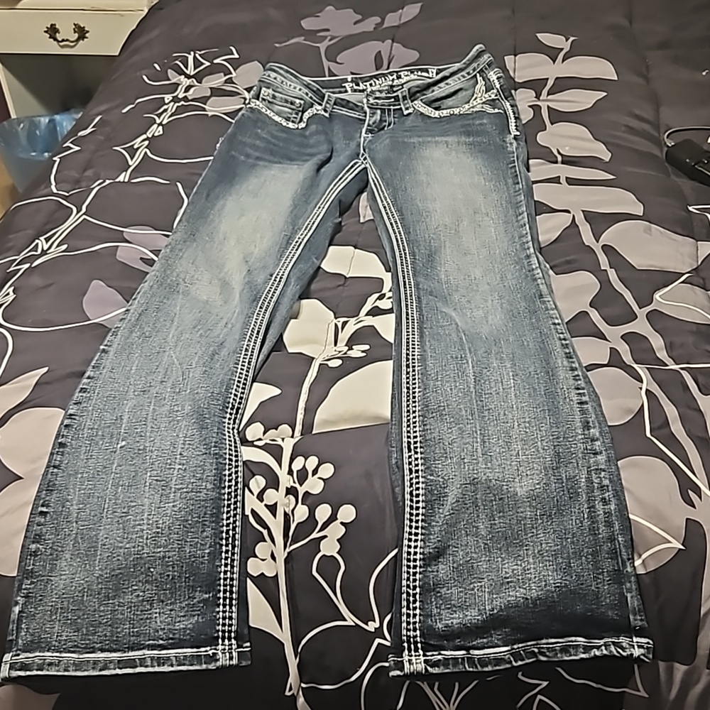 A pair of boot-cut  Platinum Plush jeans